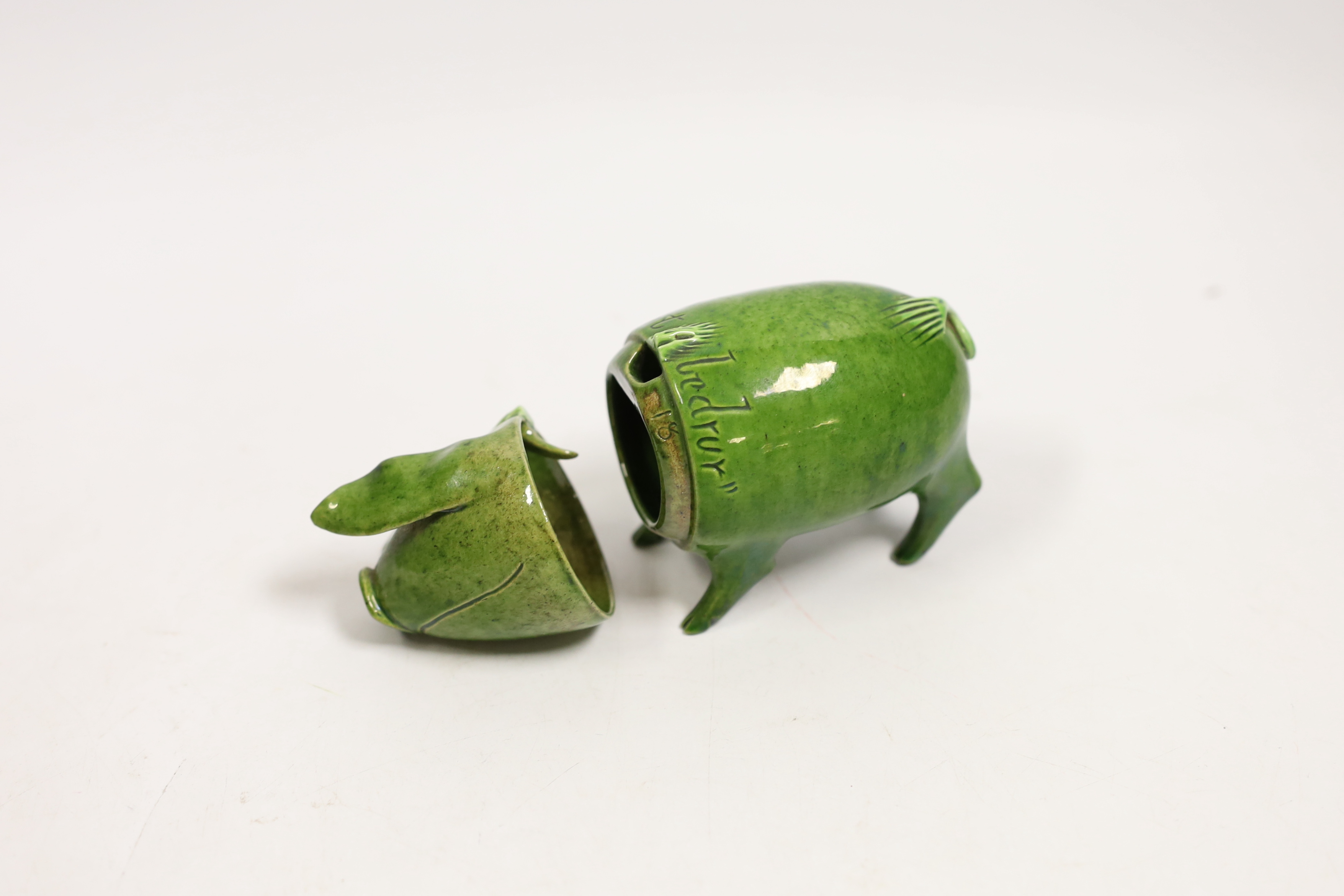 A Rye pottery green glazed pig vessel, 13cm